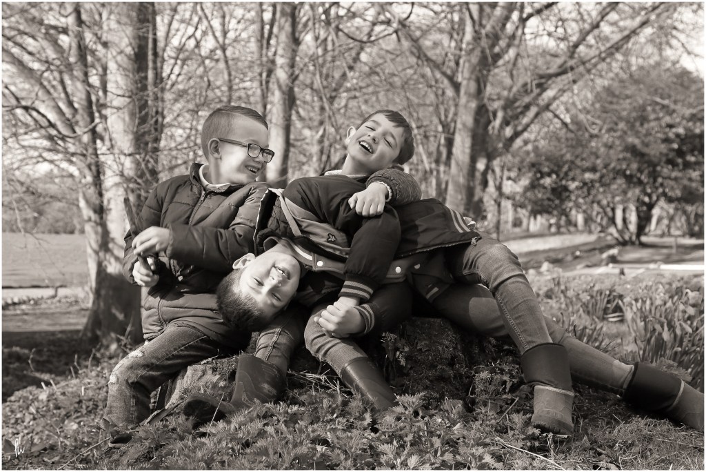 black and white photograph of three little boys at Caldicot castle