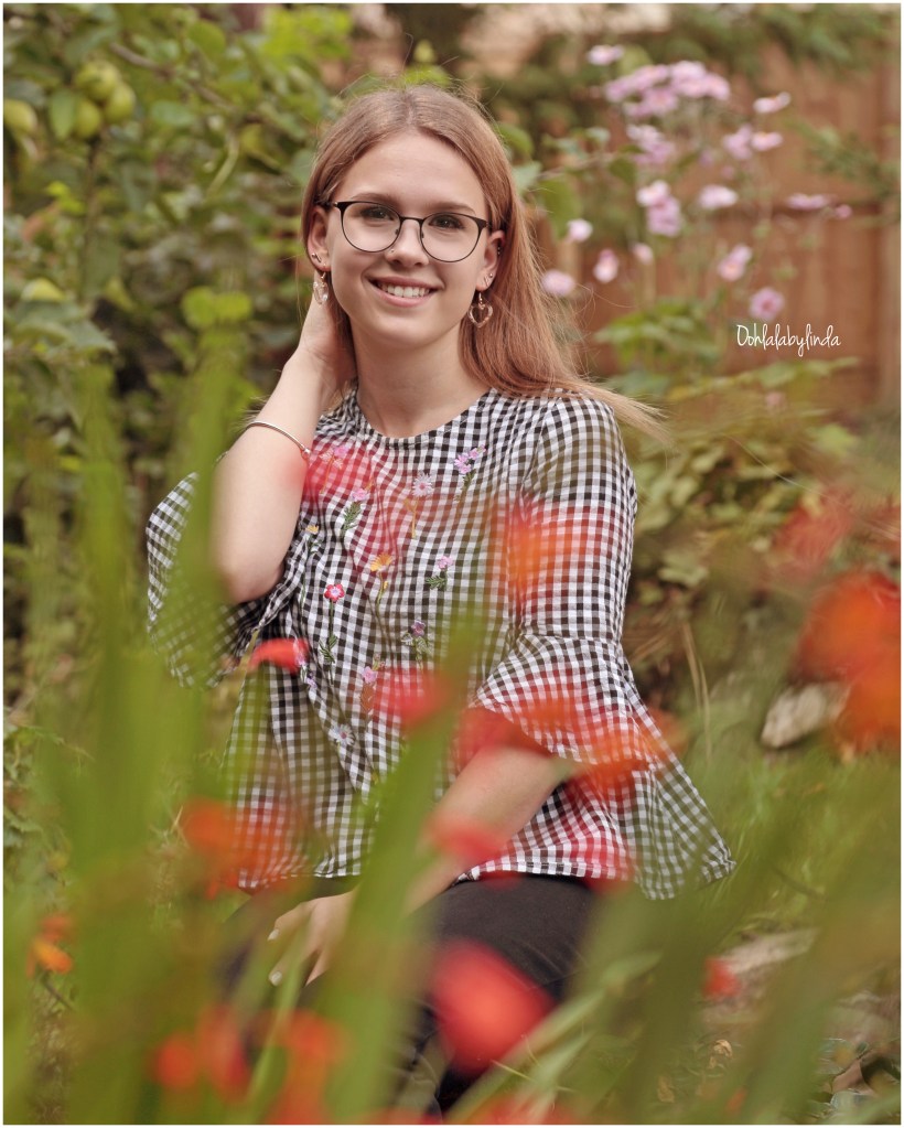portrait of teenage girl in garden