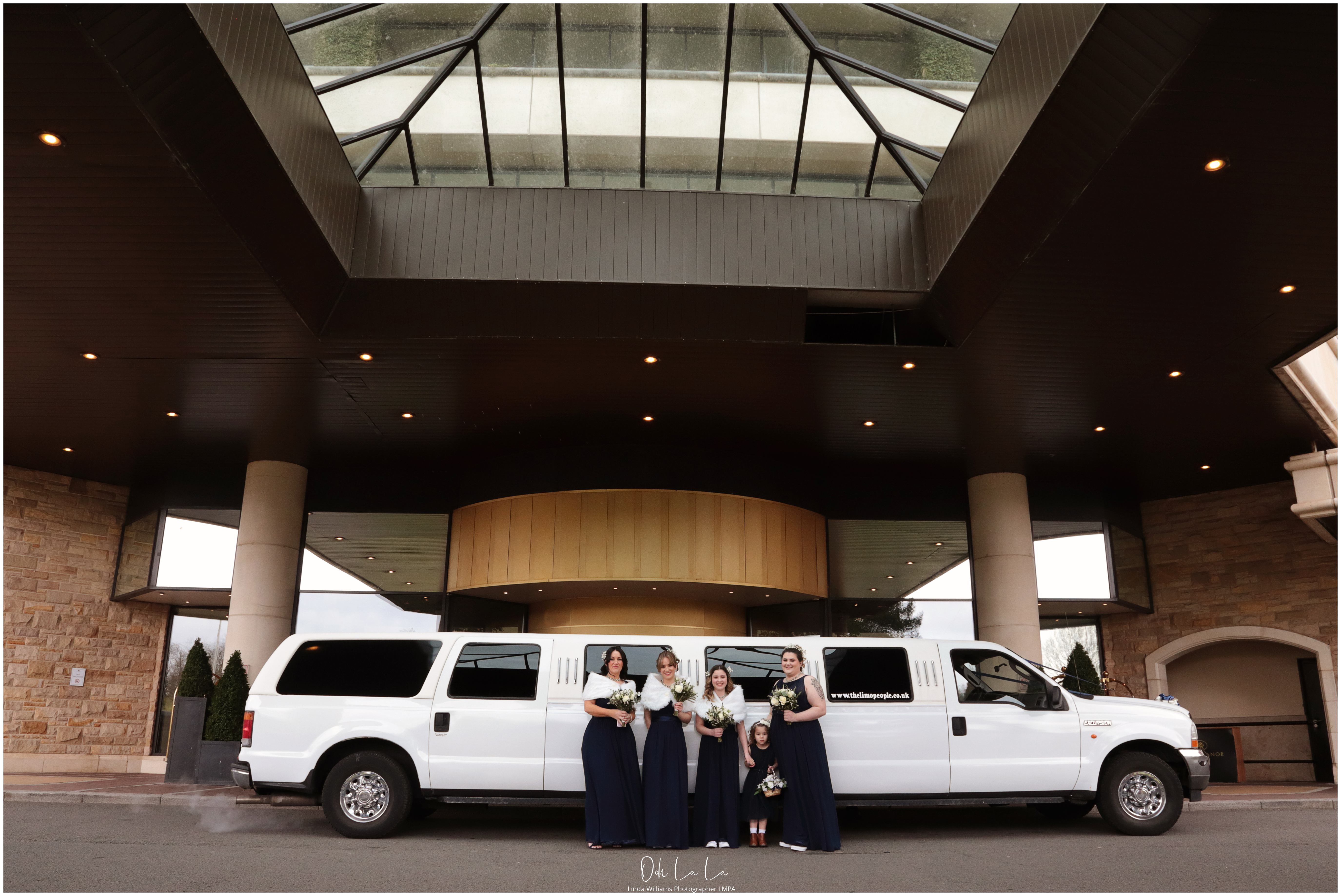 bridesmaids by stretched limo