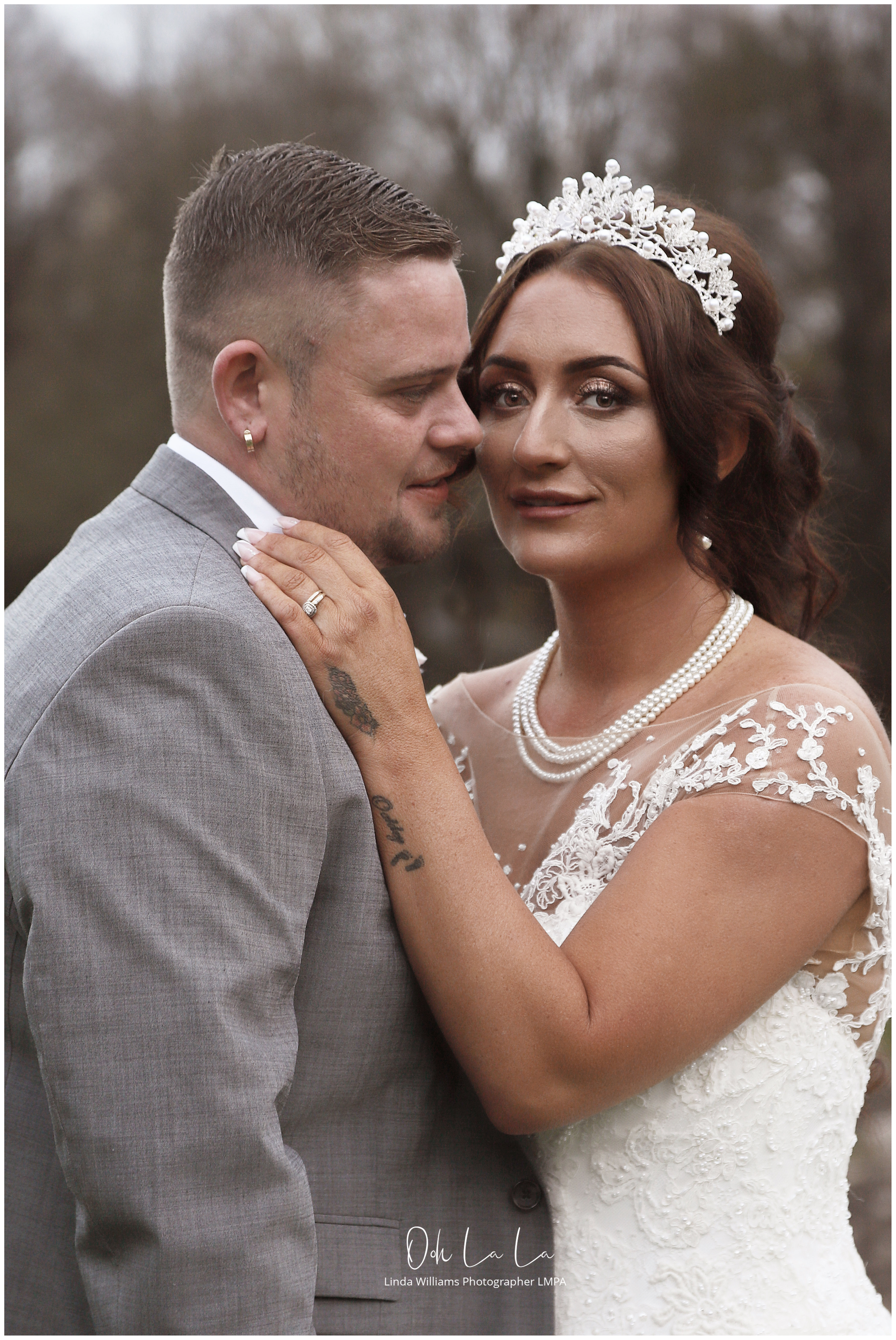 groom looking at bride