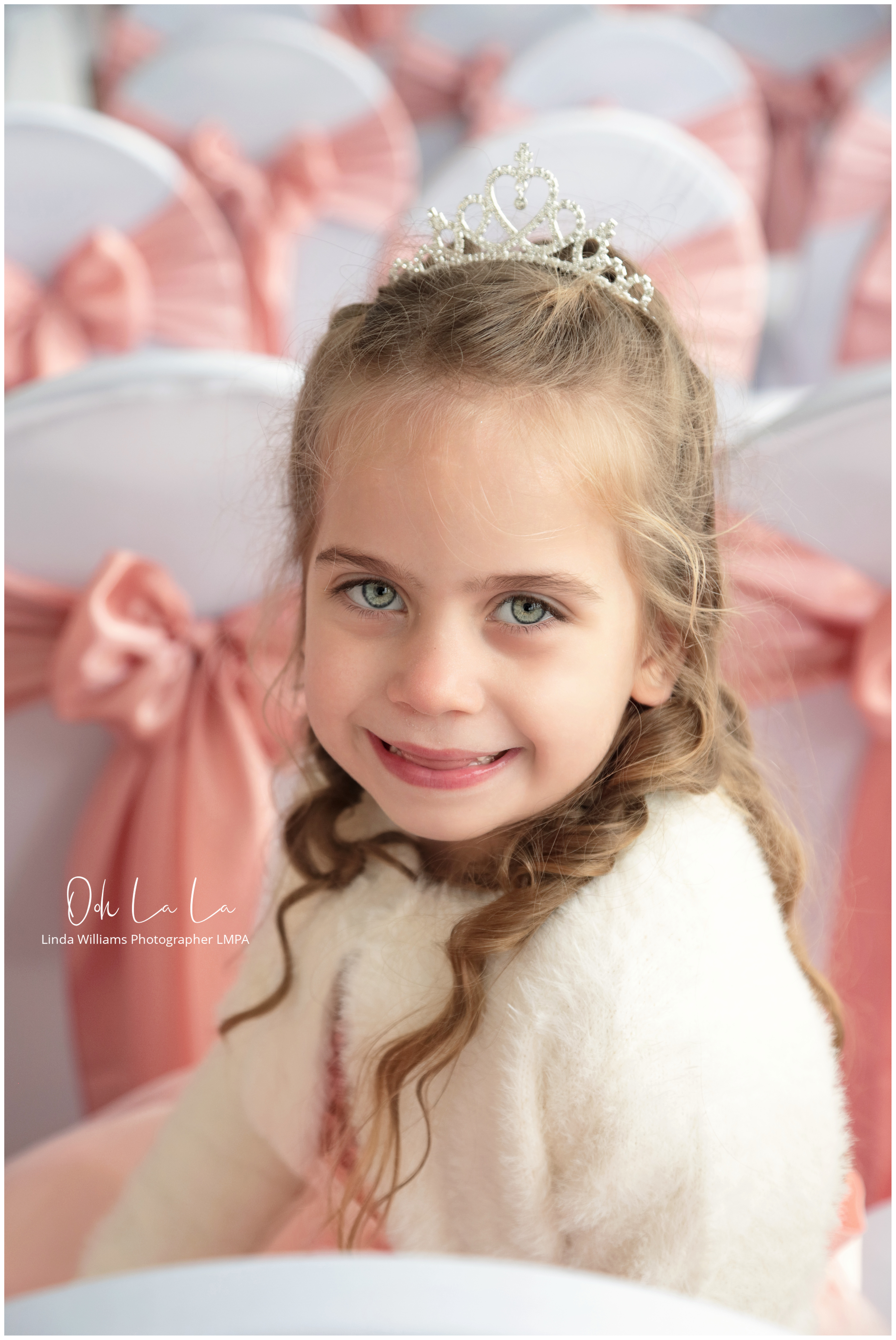 little bridesmaid with very blue eyes