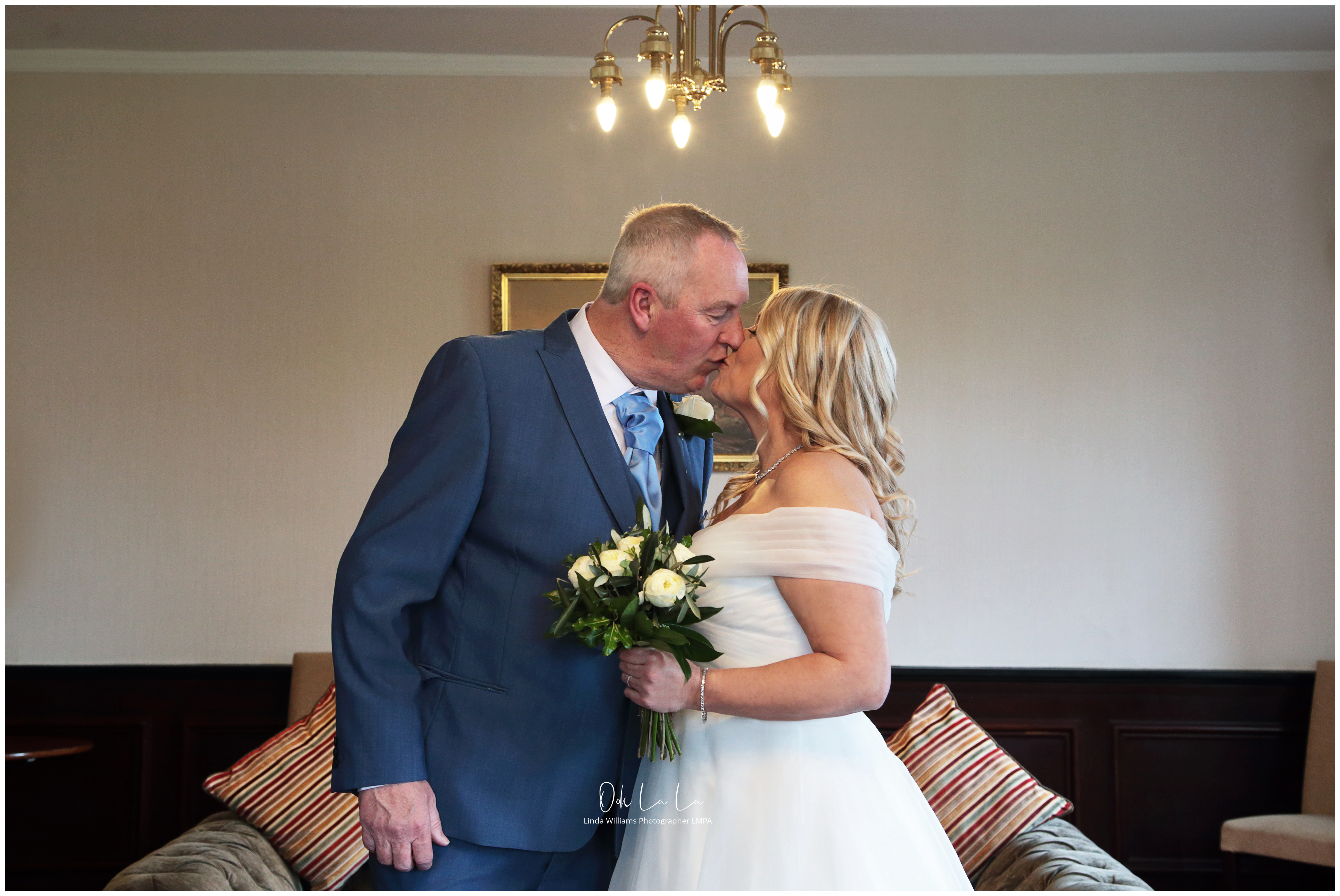 bride and groom kissing at the mansion house registry office newport