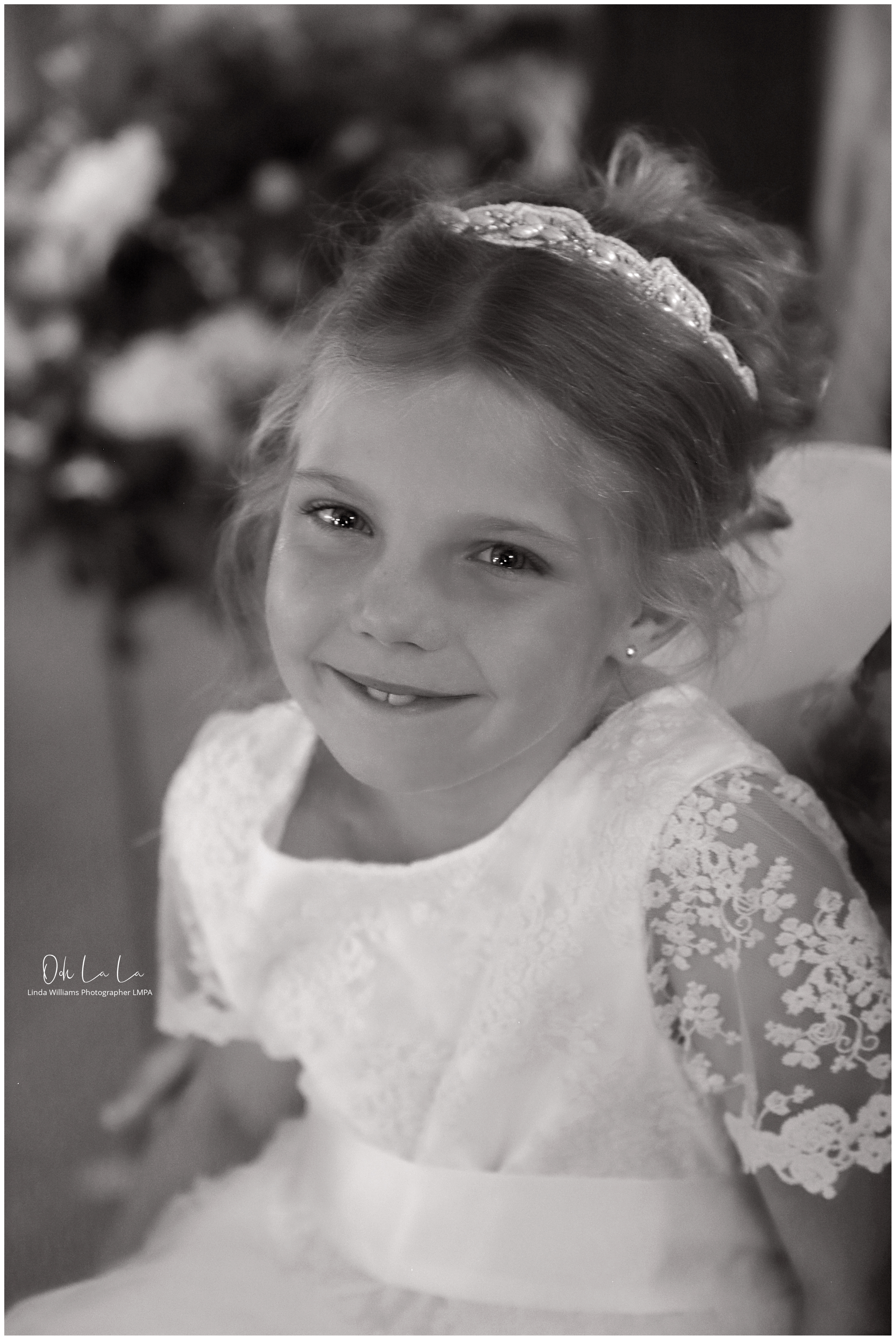 black and white portrait of bridesmaid with tears in her eyes