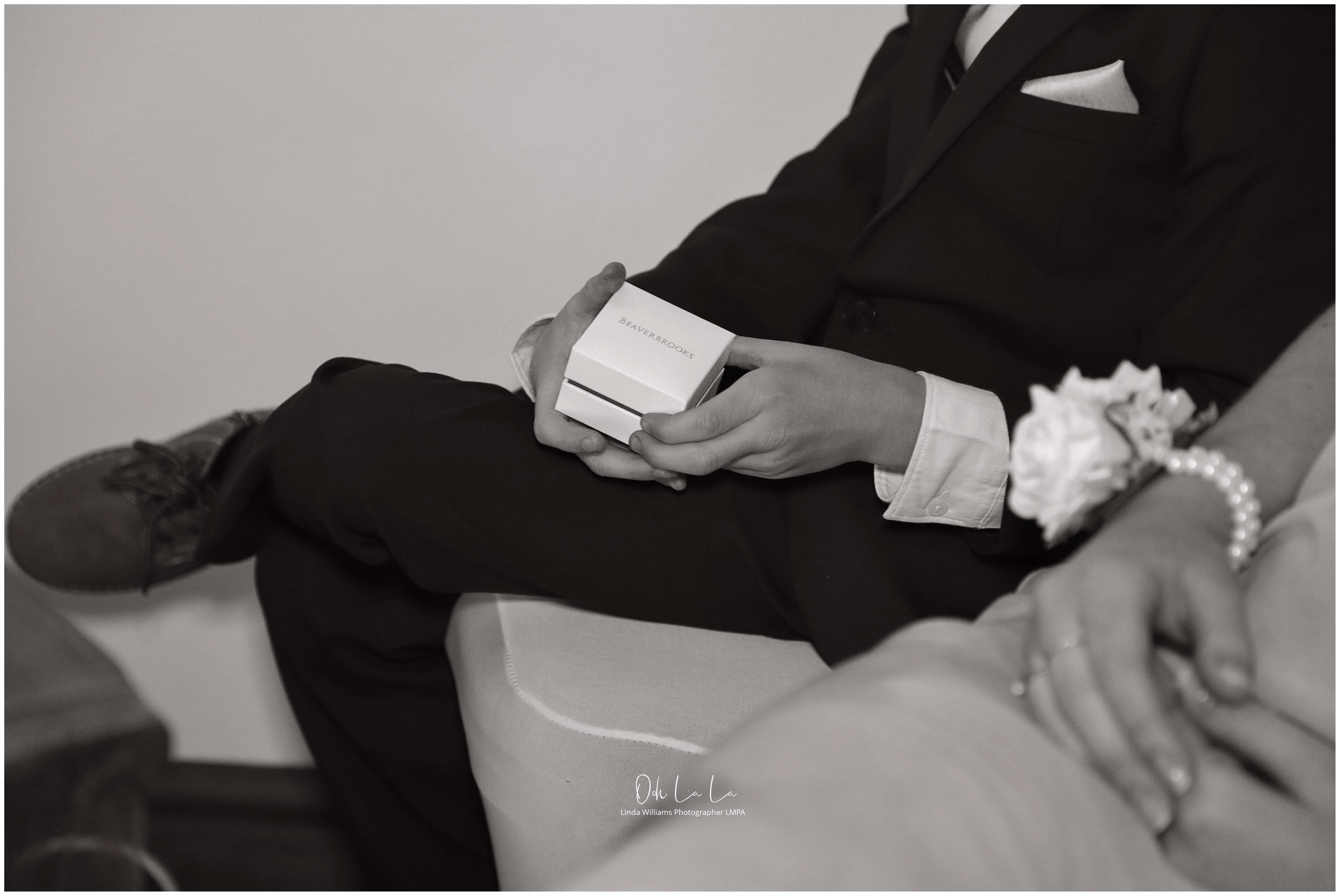 page holding wedding ring