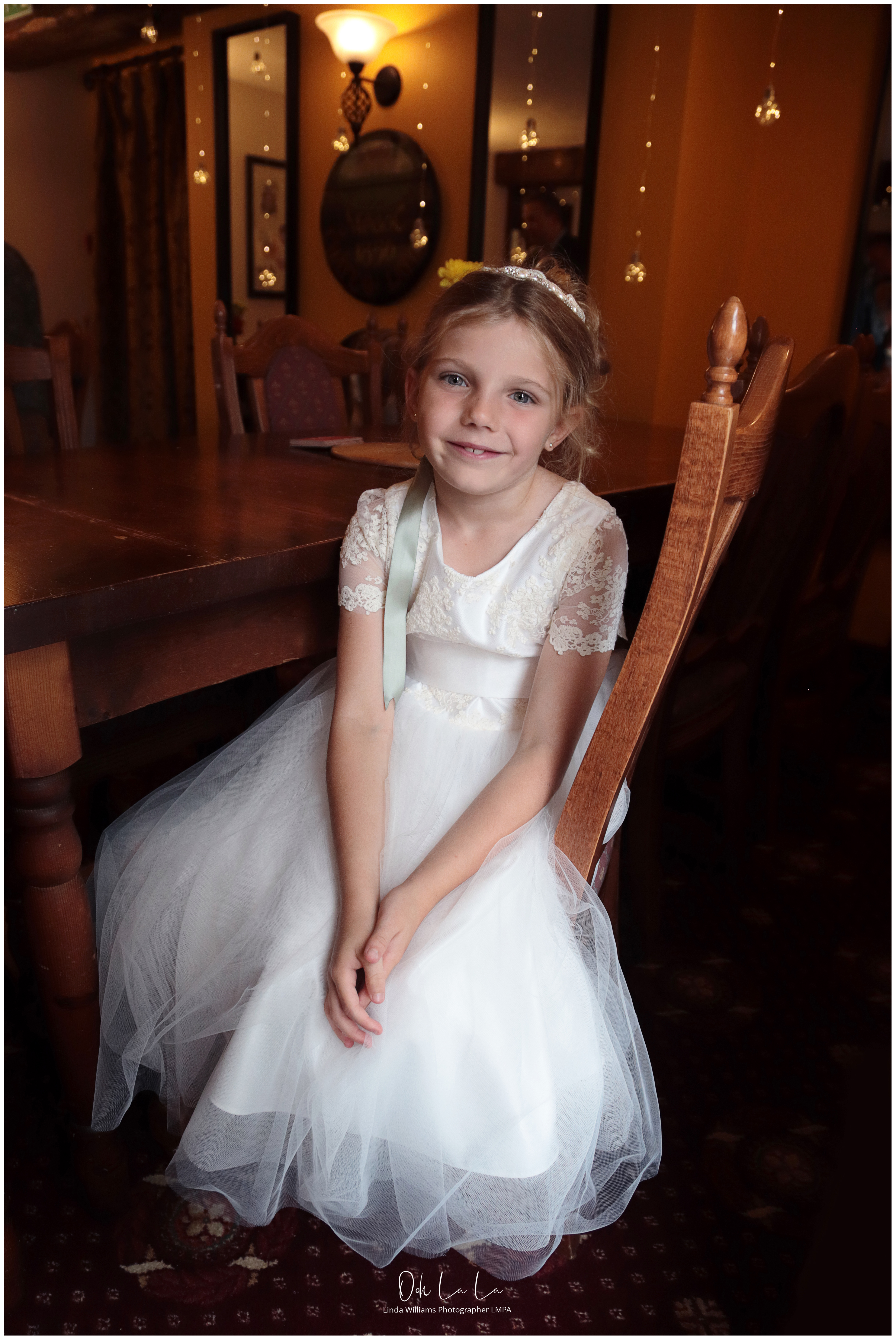 little bridesmaid in warm lighting