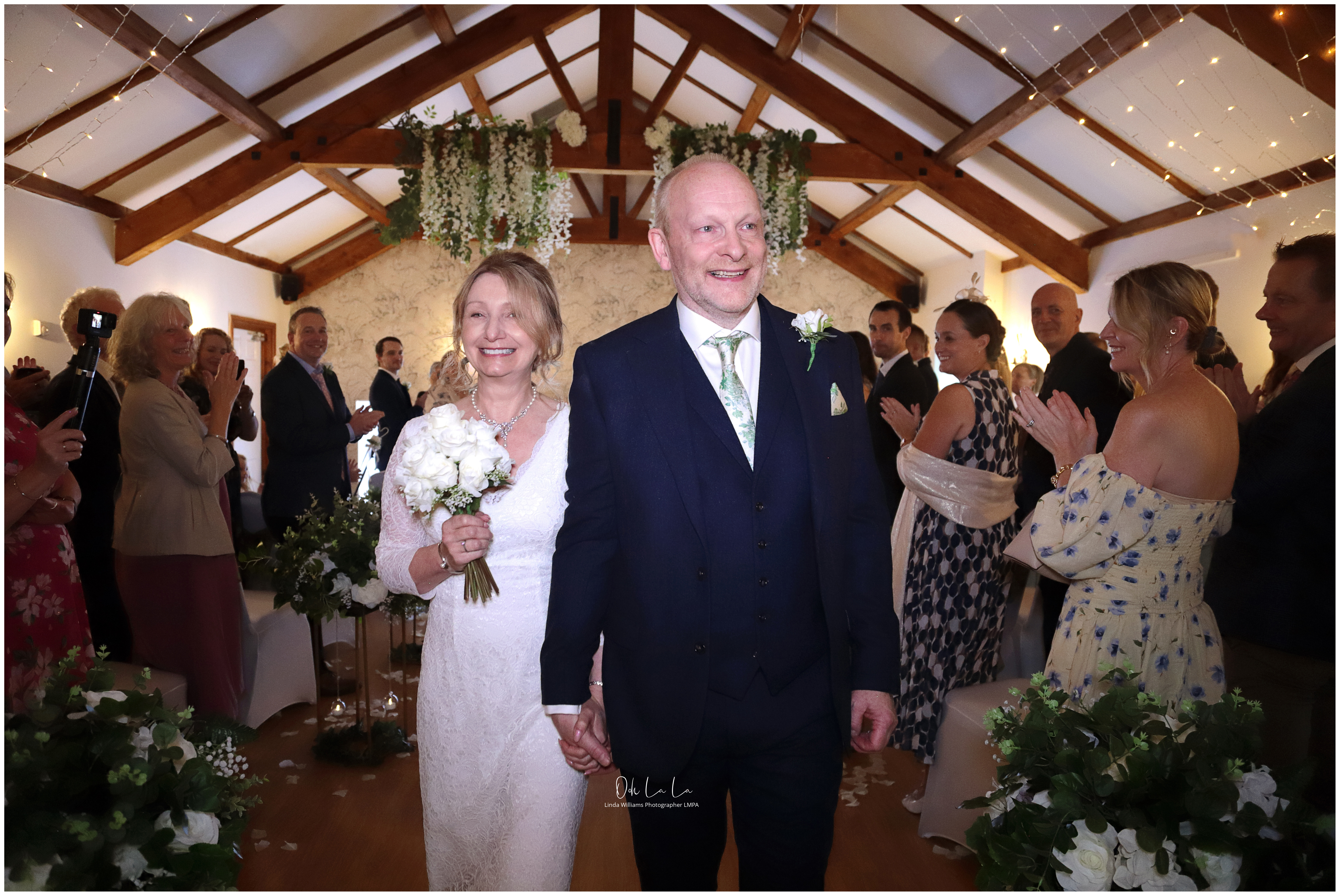 bride and groom walking down the aisle