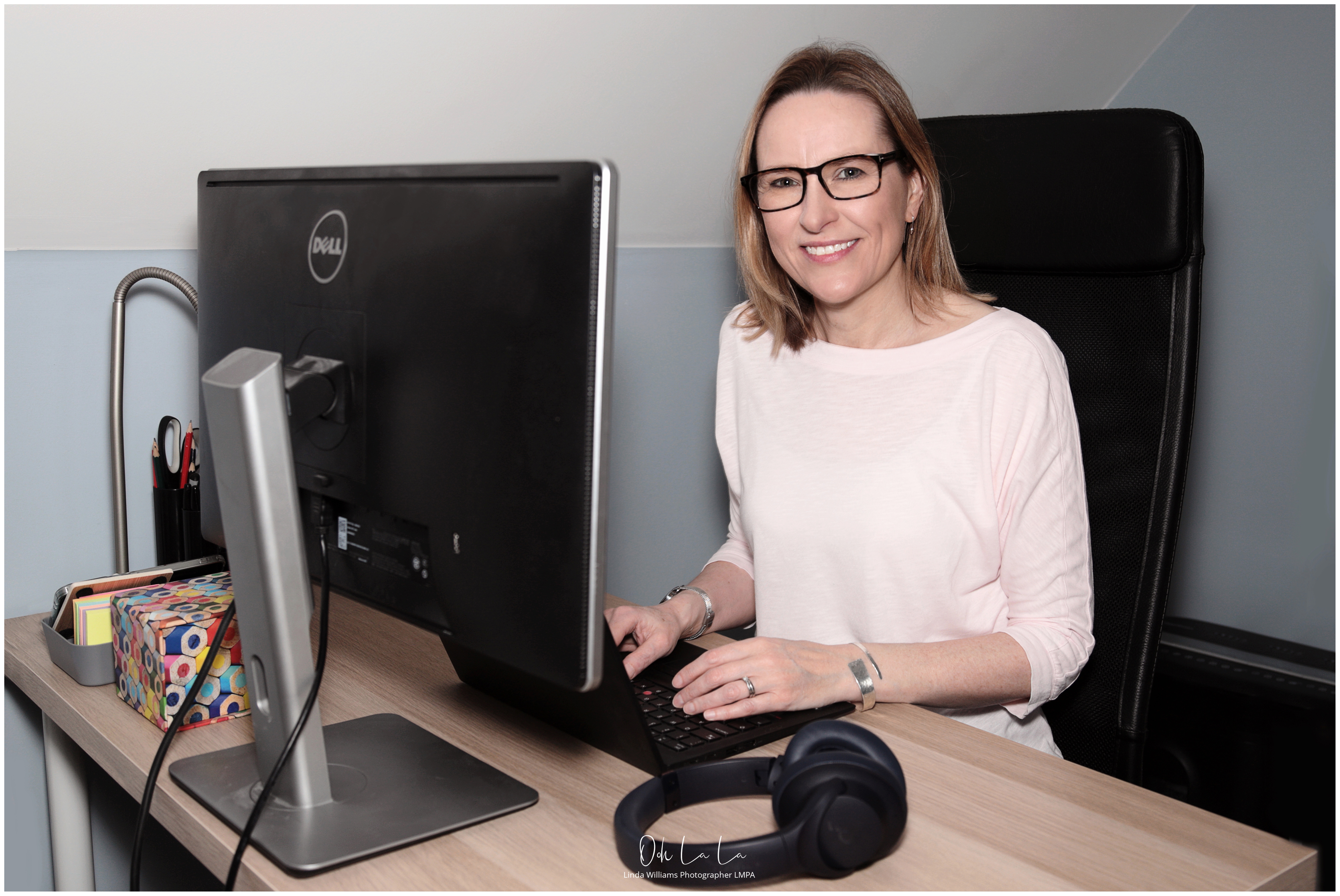 lady working at her computer for commercial business shoot